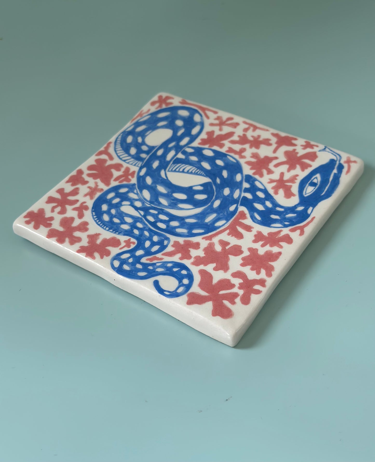 Paye ta Snake, dessous de plat